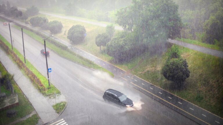 car skids on the road due to heavy rain